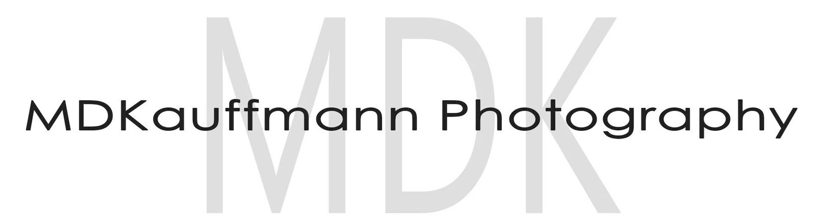 MDKauffmann Photography logo with large gray initials in the background and company name in black text overlaid.