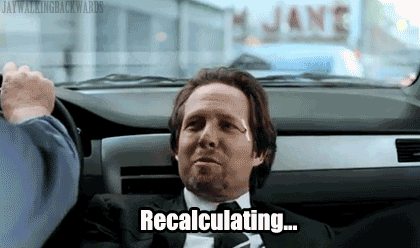 404 1 A man lying in the backseat of a car, looking relaxed with the text "Recalculating..." overlaid.